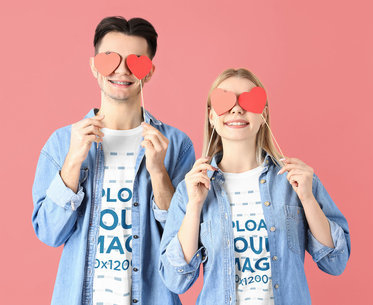 T-Shirt Mockup Featuring a Lovely Couple Holding Heart Signs