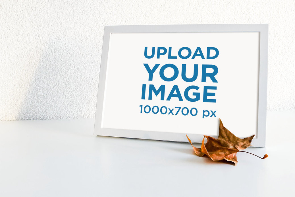 Mockup of an Art Print Frame Featuring an Autumn Leaf