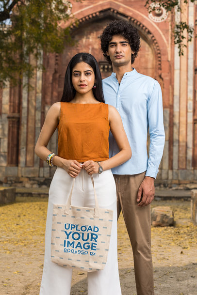 Couple Mockup Featuring a Woman Holding a Tote Bag 