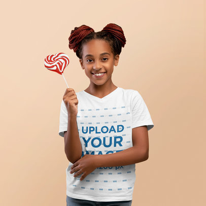 T-Shirt Mockup of a Young Girl with Space Buns Enjoying a Lollipop m17965-r-el2
