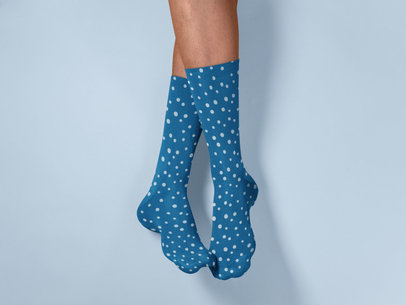 Sublimated Socks Mockup Featuring a Customizable Background 