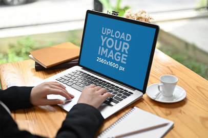 MacBook Pro Mockup of a Student at a Coffee Shop