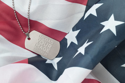 Mockup of a Military Dog Tag Lying on an American Flag