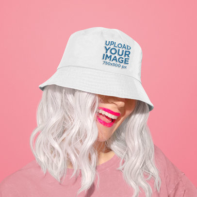 Mockup of a Happy White-Haired Woman Wearing a Bucket Hat