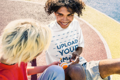 Mockup of a Young Man Wearing an Oversized T-Shirt