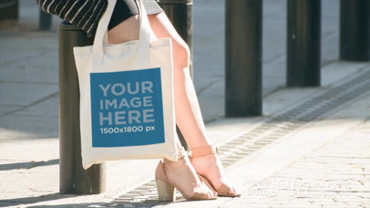 White Pretty Woman Carrying A Tote Bag While At Downtown Mockup Video