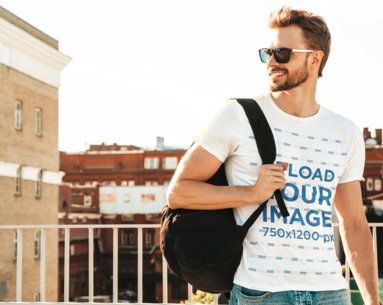 T-Shirt Mockup Featuring a Man With a Backpack and Sunglasses