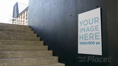 Poster on a Wall Near Stairways While a Woman Passes By Video
