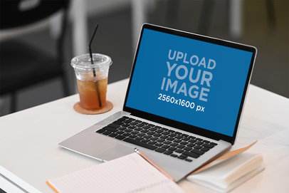 MacBook Mockup Featuring a Desk with an Iced Tea M16866-r-el2