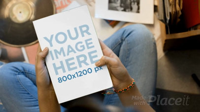 Video Of A Teenager Girl Sitting Down On The Floor While Looking At A Book a14012b