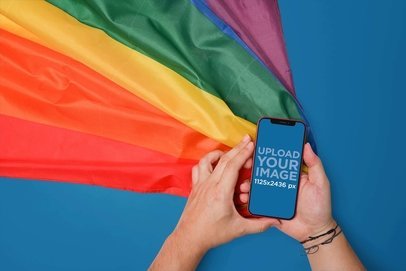 Mockup of an iPhone 12 Pro Featuring an LGBT Pride Flag