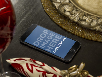 iPhone 6 Mockup on Table with Christmas Decorations