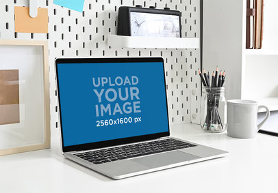 Mockup of a MacBook on a Clean Office Desk