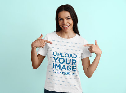 Mockup of a Happy Brunette Woman Pointing at Her T-Shirt