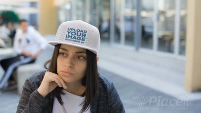 Young Hispanic Woman Wearing a Snapback Hat Video Hanging out at the Cafeteria