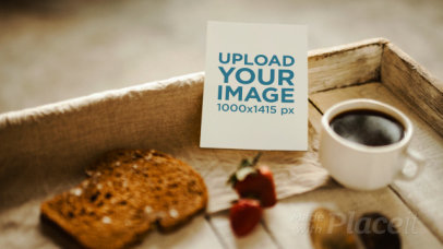 Small Flyer Stop Motion Lying on a Breakfast Table while Food and a Coffee Cup are Moving