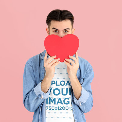 T-Shirt Mockup Featuring a Man Holding a Heart-Shaped Box for Valentine's  m21709 r-el2