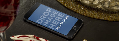 Mockup of an iPhone 6 with Christmas Decoration Around