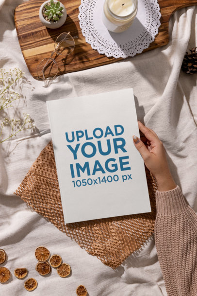 Cottagecore-Themed Mockup of a Hand Touching a Book m26958