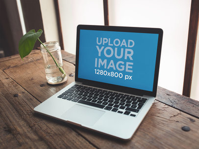 MacBook Mockup Template on a Wooden Table
