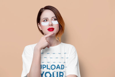 Round-Neck Tee Mockup of a Woman with Under-Eye Patches Making a Wondering Expression m22937 r-el2