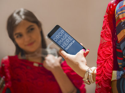 Using iPhone 6 While Trying Clothes