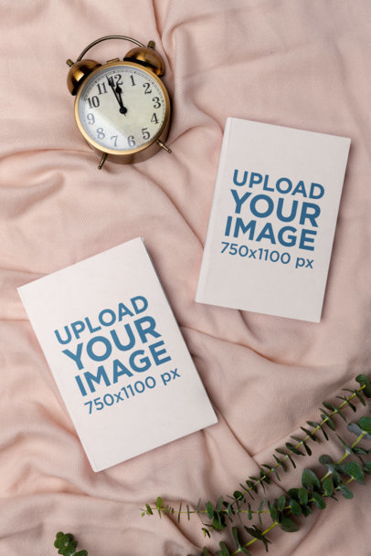 Mockup of Two 8x10 Books Featuring an Alarm Clock