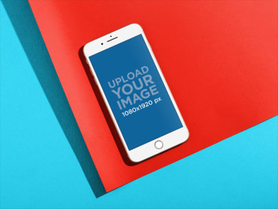 White iPhone Template Mockup Lying on a Paper over a Solid Surface