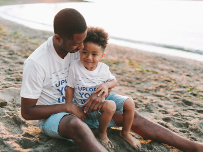 Mockup of a Father and Son Wearing Matching T-Shirts at the Beach