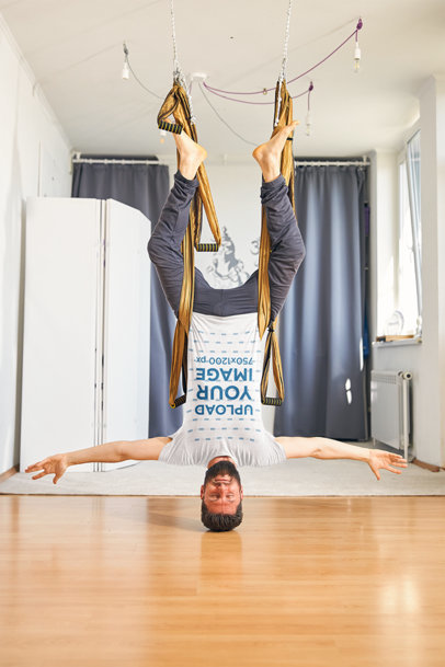Heathered Tee Mockup of a Man Hanging Upside Down from Aerial Silks m14095 r-el2