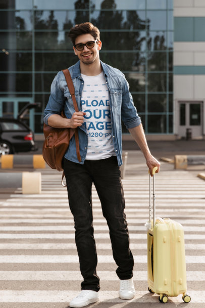 T-Shirt Mockup Featuring a Happy Bearded Man Carrying a Suitcase