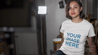 Alternative Young Woman at a Photoshoot Wearing a Round Neck Tshirt Video Mockup