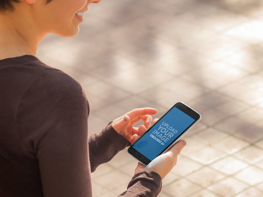 Woman with Samsung s5 Mockup at a Boulevard, Looking at App