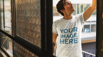 Hipster White Man Wearing a T-Shirt Stop Motion at a Balcony