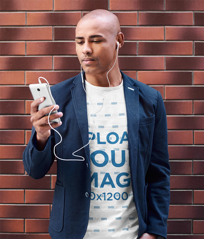 T-Shirt Mockup Featuring a Serious Man Listening to a Podcast on His Phone m19645-r-el2