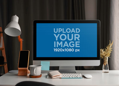 Mockup of an iMac Featuring a Desk Lamp