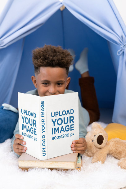 Mockup of a Boy Reading a Book Happily in His Room