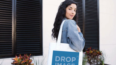 Tote Bag Stop Motion Partially Shown Held By Pretty Girl Outside Her House a13642