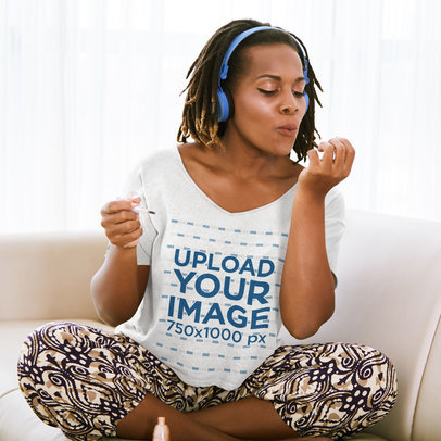 Heathered Tee Mockup of a Woman on a Couch Blowing Her Nail Polish M12985-r-el2