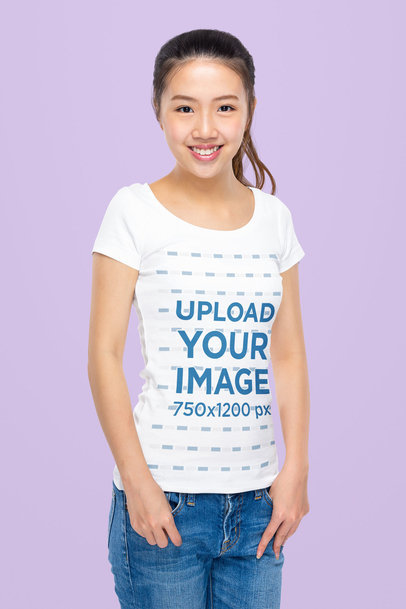 T-Shirt Mockup Featuring a Smiling Woman at a Studio