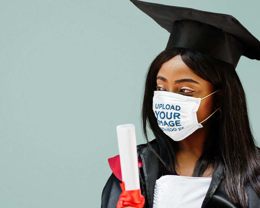 Face Mask Mockup of a Young Woman Celebrating Her Graduation Day