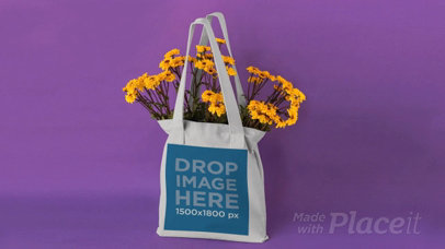 Tote Bag in Stop Motion on a Purple Room While Flowers Disappear