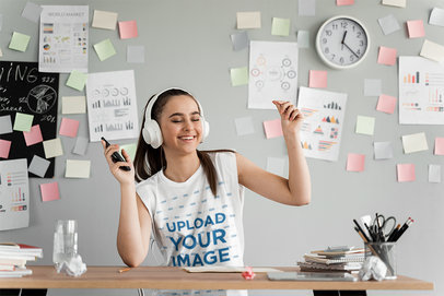 Sleeveless Tee Mockup Featuring a Happy Woman Dancing and Listening to Music