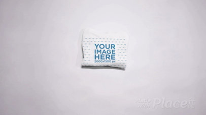 Hoodie Unfolding Itself on a White Surface in Stop Motion