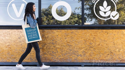 Girl Walking by Holding a Tote Bag in Stop Motion a13643