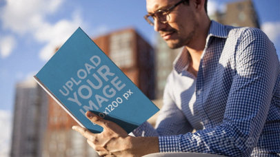Man Reading a Book While Contemplating The City in Stop Motion