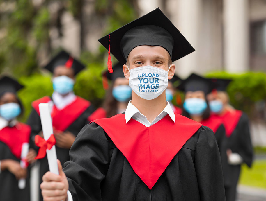 Face Mask Mockup Featuring a Proud Man With a School Diploma