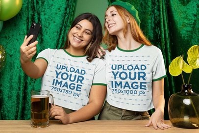 Ringer T-Shirt Mockup Featuring a Two Women Taking a Selfie in an Irish-Themed Party