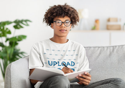 T-Shirt Mockup of a Man Studying in a Living Room m17977-r-el2