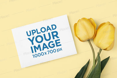 Mockup of a Horizontal Flyer Placed Next to Some Tulips m24995 r-el2